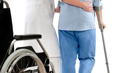© Alexander Raths - fotolia.com nurse helps a senior woman on crutches in hospital