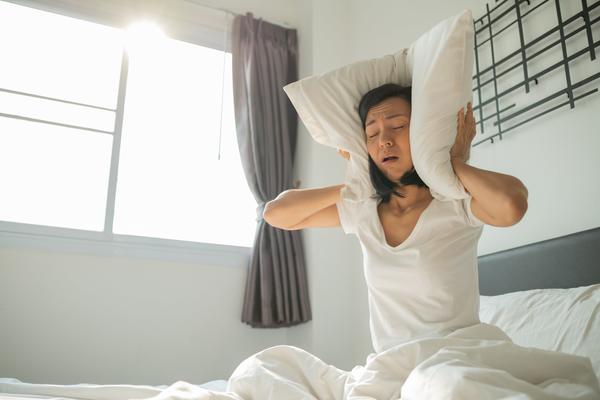 beautiful-woman-with-screams-while-sitting-bed-you